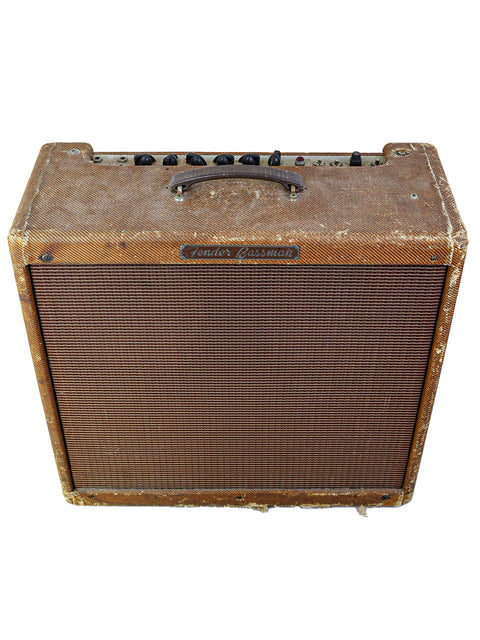Old-school Fender Bassman amp from 1959, set against a white backdrop, emphasizing its retro vibe.