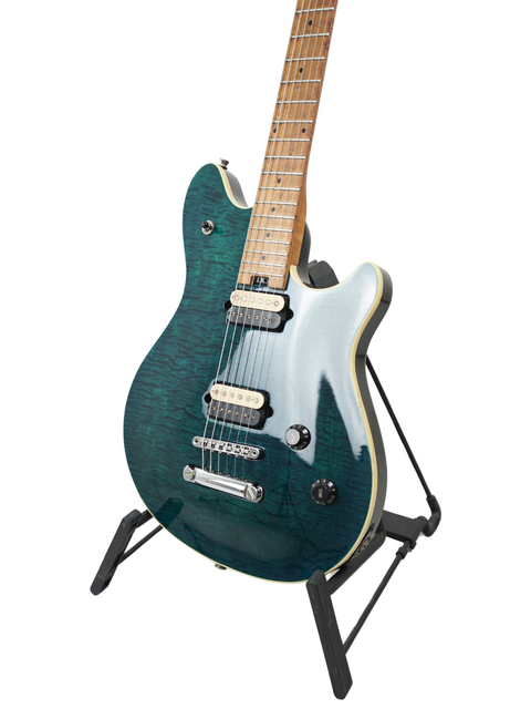 Peavey EVH Wolfgang Standard Hardtail guitar in blue, elegantly resting on a black stand.