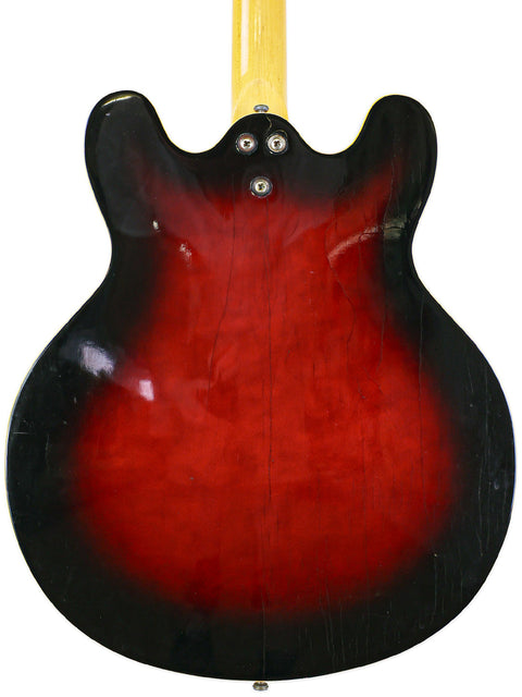 Red and black 1967 Mosrite Celebrity III guitar with a stylish black headstock, showcasing its vintage charm.
