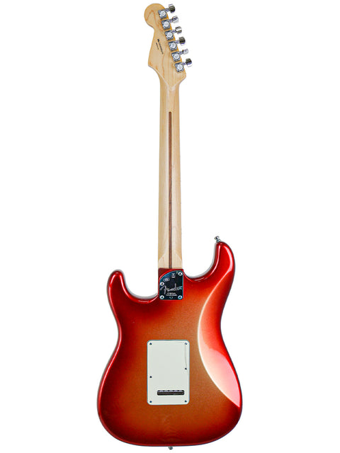 Red and sunburst electric guitar with maple neck isolated on white background.