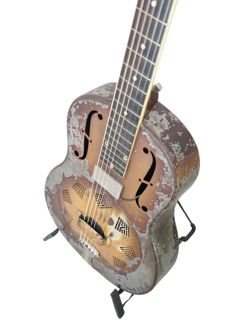 Rustic design on a 1930 National Triolian guitar, highlighting its vintage charm and unique craftsmanship.
