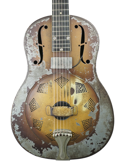 Rusty-finished 1930 Vintage National Triolian guitar, showcasing a classic black pick guard.
