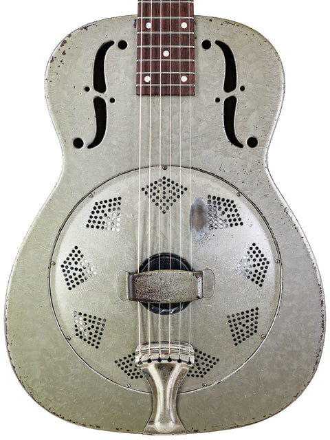 Silver 1936 National Duolian resonator guitar featuring a stylish black pick guard.