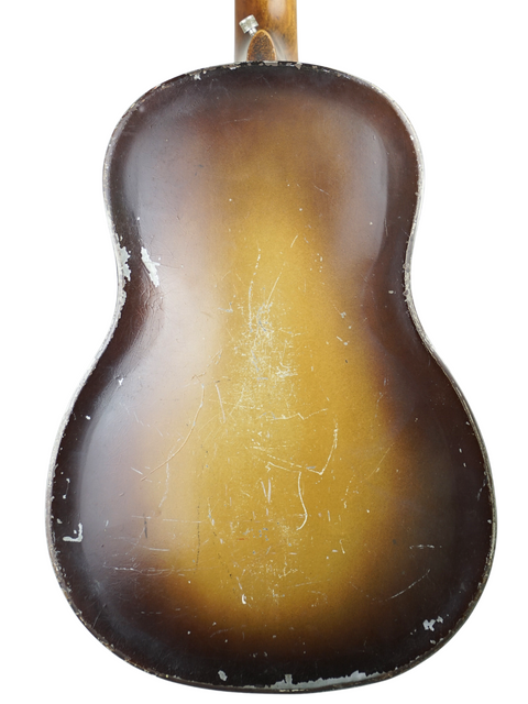 Stunning 1951 Gibson J-45 in sunburst, highlighting its vintage charm next to a 1930 National Triolian guitar.