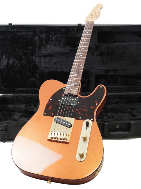 Stunning Gordon Smith Classic T guitar with a protective case, showcasing elegance and craftsmanship for every guitarist.