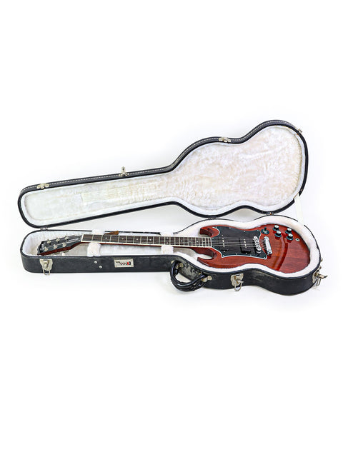 Stylish Gibson SG Classic guitar in a sleek black case, perfect for musicians seeking quality and protection for their instrument.
