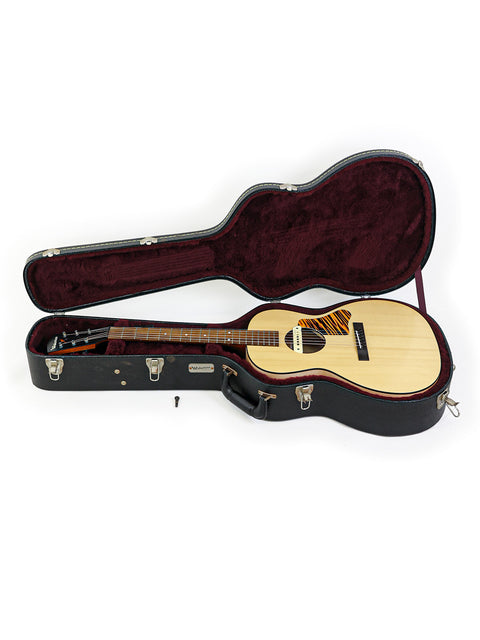 Stylish black guitar case housing a beautiful wooden body, featuring the Waterloo WL-14 X Scissortail from the USA.