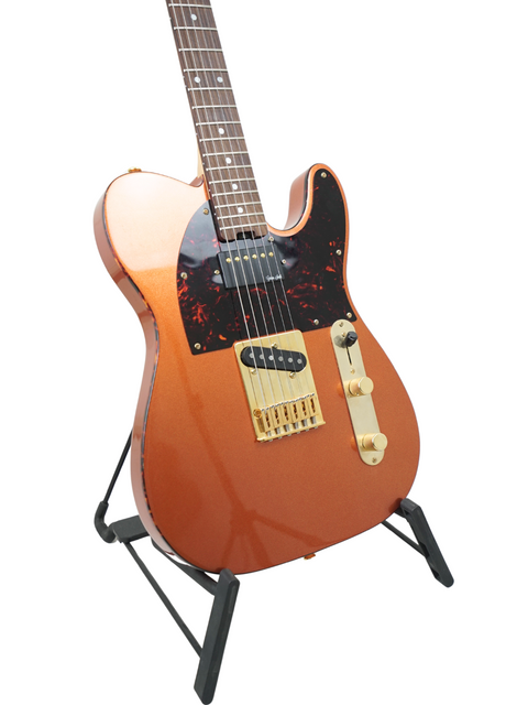 Stylish black guitar with a bold orange neck, a must-have for any serious musician. Gordon Smith Classic T - UK 2021.