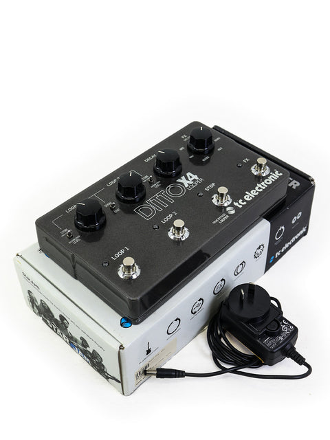 TC Electronic Ditto X4 looper pedal in black and white, complete with a power cord, ideal for creative music-making.