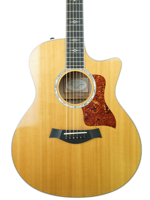 Taylor 616ce grand acoustic guitar from 2011, featuring elegant design and warm, resonant sound perfect for any musician.