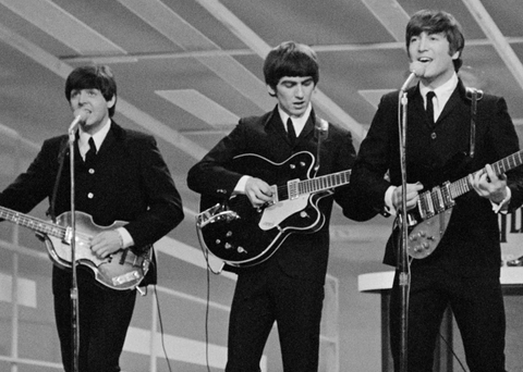 The Beatles showcased on their television program, with a 1967 Gretsch 6122 Chet Atkins guitar prominently displayed.
