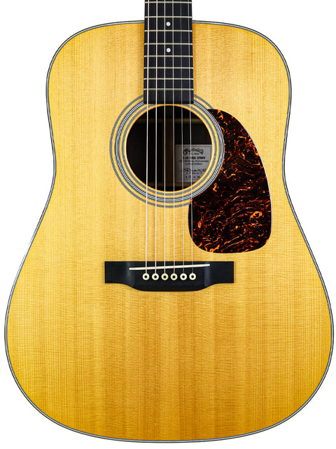 The Martin D-28 CFM IV, a limited edition acoustic guitar celebrating 55 years, featuring exquisite details and rich wood tones.
