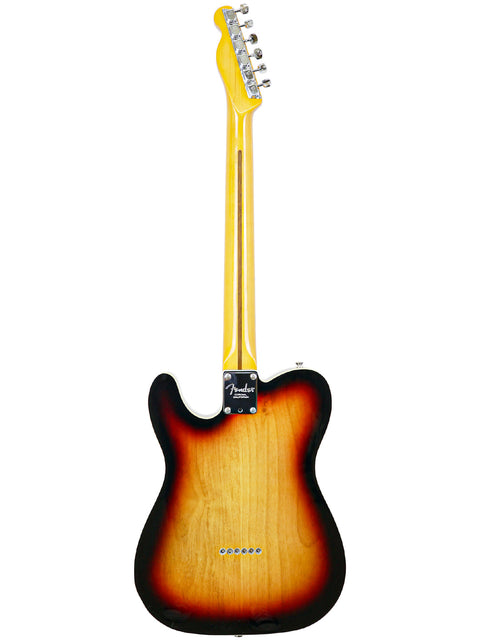 The Txxx Custom Thinline '72 Partscaster, 2022 model, flaunts a vibrant sunburst finish on its elegant guitar body.
