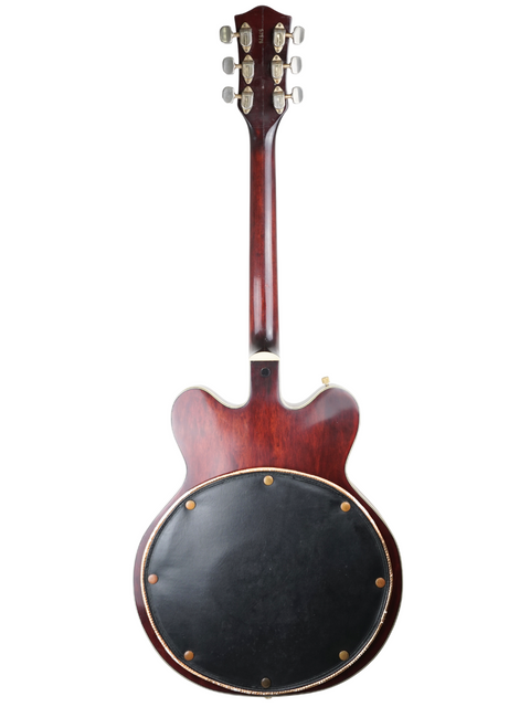 The iconic Gibson Les Paul Standard in cherry, paired with a classic 1967 Gretsch 6122 Chet Atkins Country Gentleman guitar.