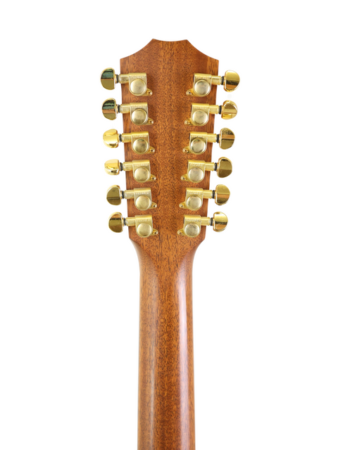 The neck of a 1995 Taylor LKSM Leo Kottke 12-string guitar, featuring a beautifully crafted wooden headstock.
