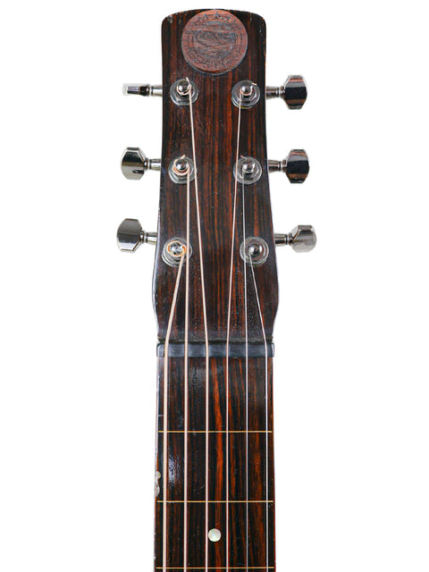 The neck of a Tim Kill Custom Teardrop acoustic guitar, made in Australia in 2013, featuring intricate woodwork.