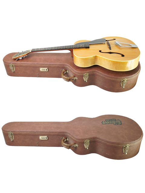 Two classic guitars in a case, covered up, featuring the vintage Vega C-66 Advanced Series from the USA, 1940.