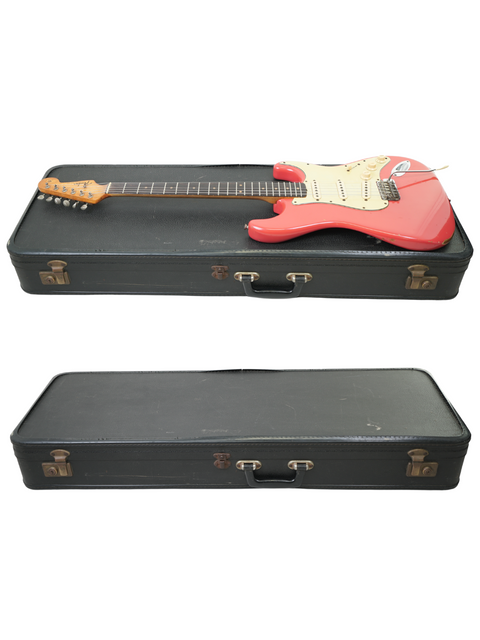 Two guitars, one a 1963 Fender Stratocaster Fiesta Red, neatly arranged in a case on a clean white background.
