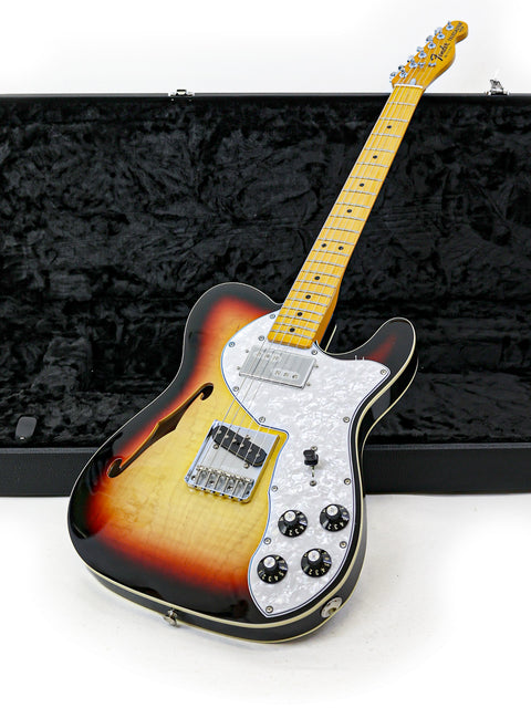 Txxx Custom Thinline '72 Partscaster - 2022, featuring a sunburst finish, resting in its case, looking ready to play.
