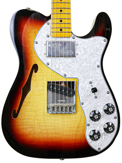 Txxx Custom Thinline '72 Partscaster from 2022, featuring a beautiful sunburst finish on its sleek guitar body.