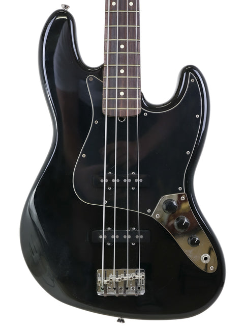 USA-made 2005 Fender Jazz Bass guitar in black, set against a white background.