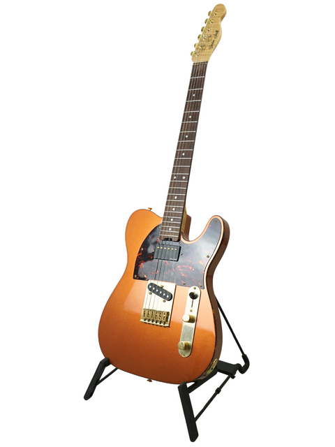 Vibrant orange guitar featuring a stylish black neck, designed for serious musicians. Gordon Smith Classic T - UK 2021.