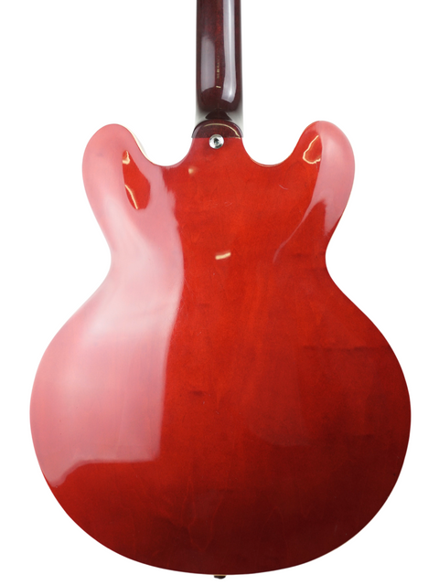 Vibrant red guitar with a stylish black body and white headstock, a must-have for any guitarist looking to stand out.
