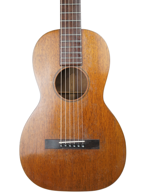 Vintage 1930s-40s koa-wood guitar, a Martin 2-17 Flat Top from 1928, showcasing exquisite craftsmanship and historical significance.
