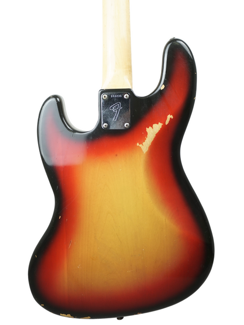 Vintage 1972 Fender Jazz Bass guitar featuring a beautiful sunburst finish, perfect for any music lover.