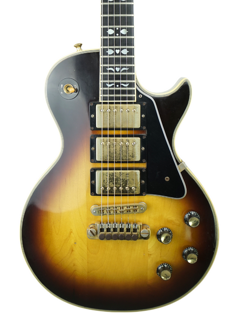 Vintage 1978 Gibson Les Paul Artisan electric guitar with a striking sunburst finish, showcasing its classic design and craftsmanship.