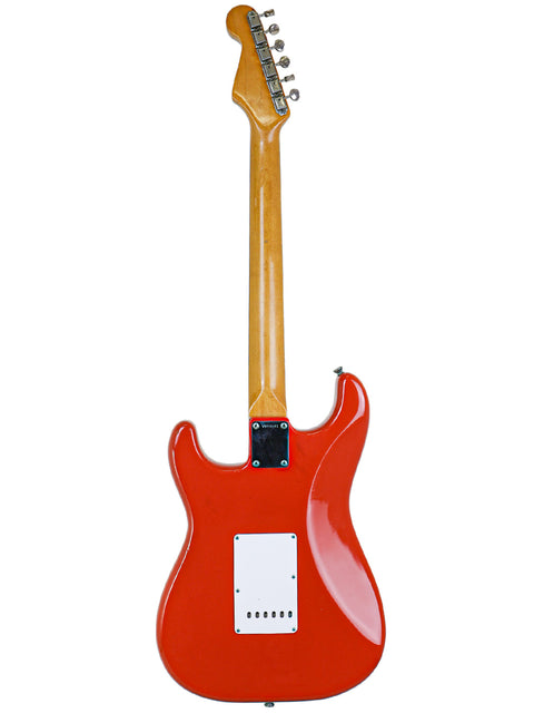 Vintage 1982 Fender AVRI ‘62 Stratocaster: a bold red electric guitar with a stylish white body, perfect for any music lover.