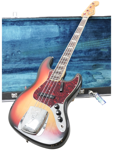 Vintage Fender Jazz Bass from 1972, elegantly stored in its case, perfect for any music lover.