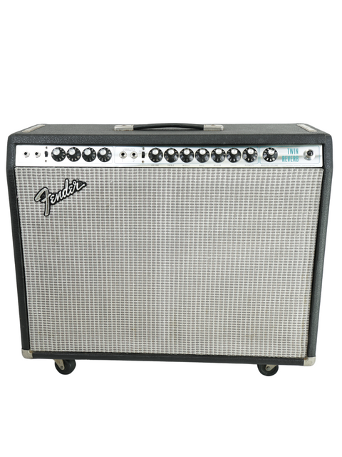 Vintage Fender Twin Reverb amp from 1974, equipped with two 12" speakers, perfect for a Stratocaster guitar setup.