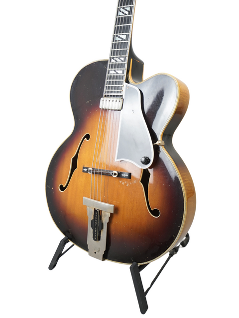 Vintage Gibson Johnny Smith guitar from 1966, featuring a sunburst finish, once owned by renowned musicians Ike Isaacs and George Benson.