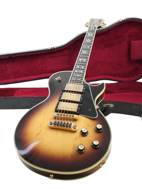 Vintage Gibson Les Paul Artisan guitar from 1978, elegantly presented with its protective case, emphasizing its timeless style.