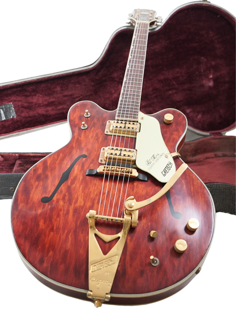 Vintage Gretsch 6122 Chet Atkins guitar from 1967, presented with its case, exemplifying timeless style and quality.