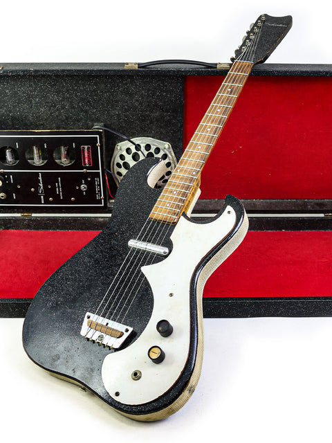 Vintage Harmony Silvertone 1448 electric guitar with case, set against a clean white background, highlighting its classic style.
