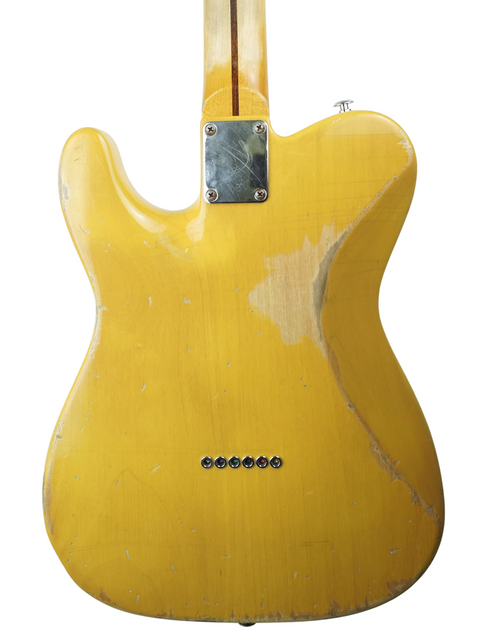 Yellow guitar with a wooden body and neck, the Suhr Classic T Antique from 2015, featuring a butterscotch finish.
