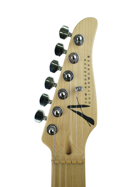 Zoomed-in image of a Tom Anderson Hollow T Classic Contoured guitar head, highlighted by a plain white background.