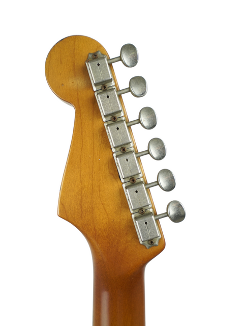  Zoomed-in image of the neck of a Fender Custom Shop '60 Stratocaster Hardtail electric guitar, featuring its elegant structure.