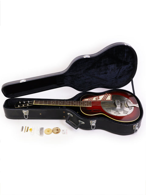 1937 National Trojan Resonator guitar in striking red and black, displayed in a stylish case, highlighting its vintage appeal.