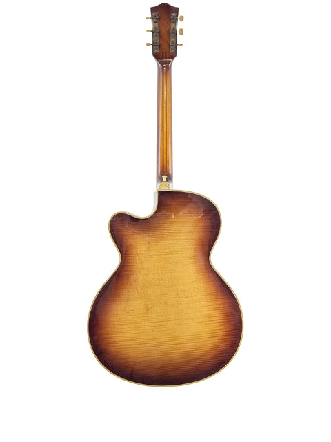 1950s Hofner 455 Archtop guitar with a warm brown body and neck, representing German vintage design and craftsmanship.