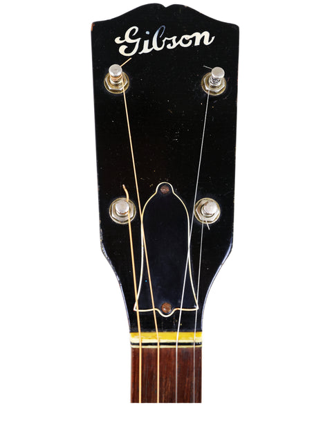 1953 Gibson Les Paul Standard, an iconic electric guitar known for its rich tone and timeless design, ideal for any guitarist.
