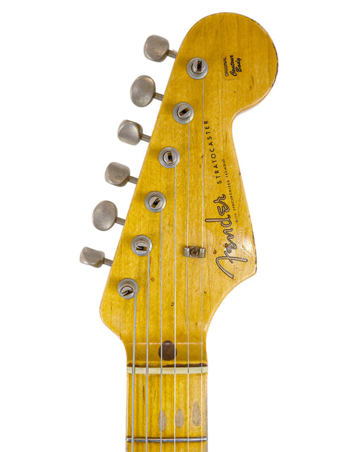1961 Fender Stratocaster, showcasing a relic finish, part of the Fender Custom Shop ’56 series from 2008.