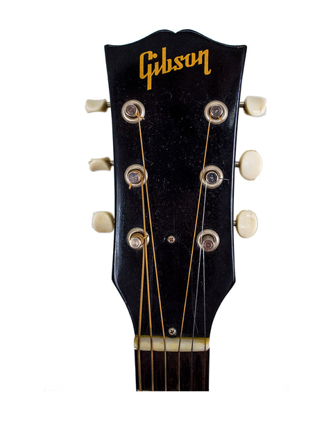 1962 Gibson Les Paul Standard, a vintage electric guitar known for its iconic shape and rich sound.
