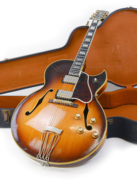 1966 vintage Gibson Byrdland guitar and case showcased on a bright white background.