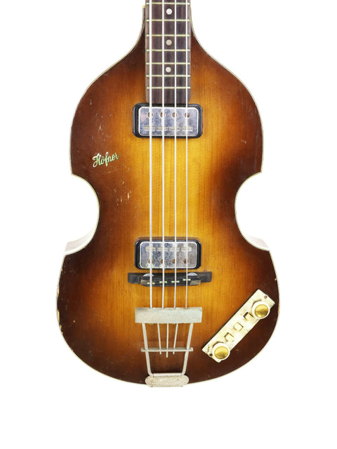 A 1962 Hofner 500/1 'Beatle Bass' showcasing a rich brown body, embodying vintage musical craftsmanship.