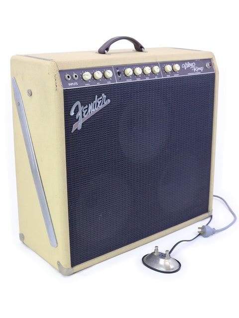 A 2003 Fender Custom Shop Vibro-King Combo Amp with a microphone resting on top, showcasing a classic music setup.
