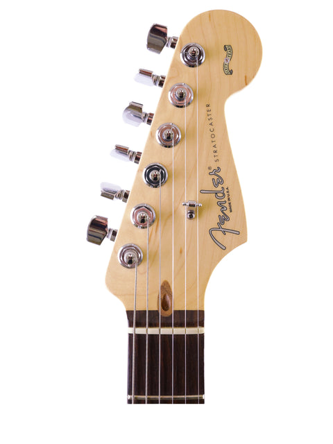 A 2006 Fender 60th Anniversary American Stratocaster, highlighting its sleek design and rich sound, perfect for any guitarist.