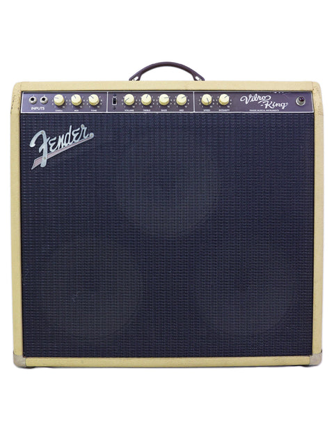 A Fender Custom Shop Vibro-King Combo Amp from 2003, showcasing a vintage 30W tube design with classic styling.